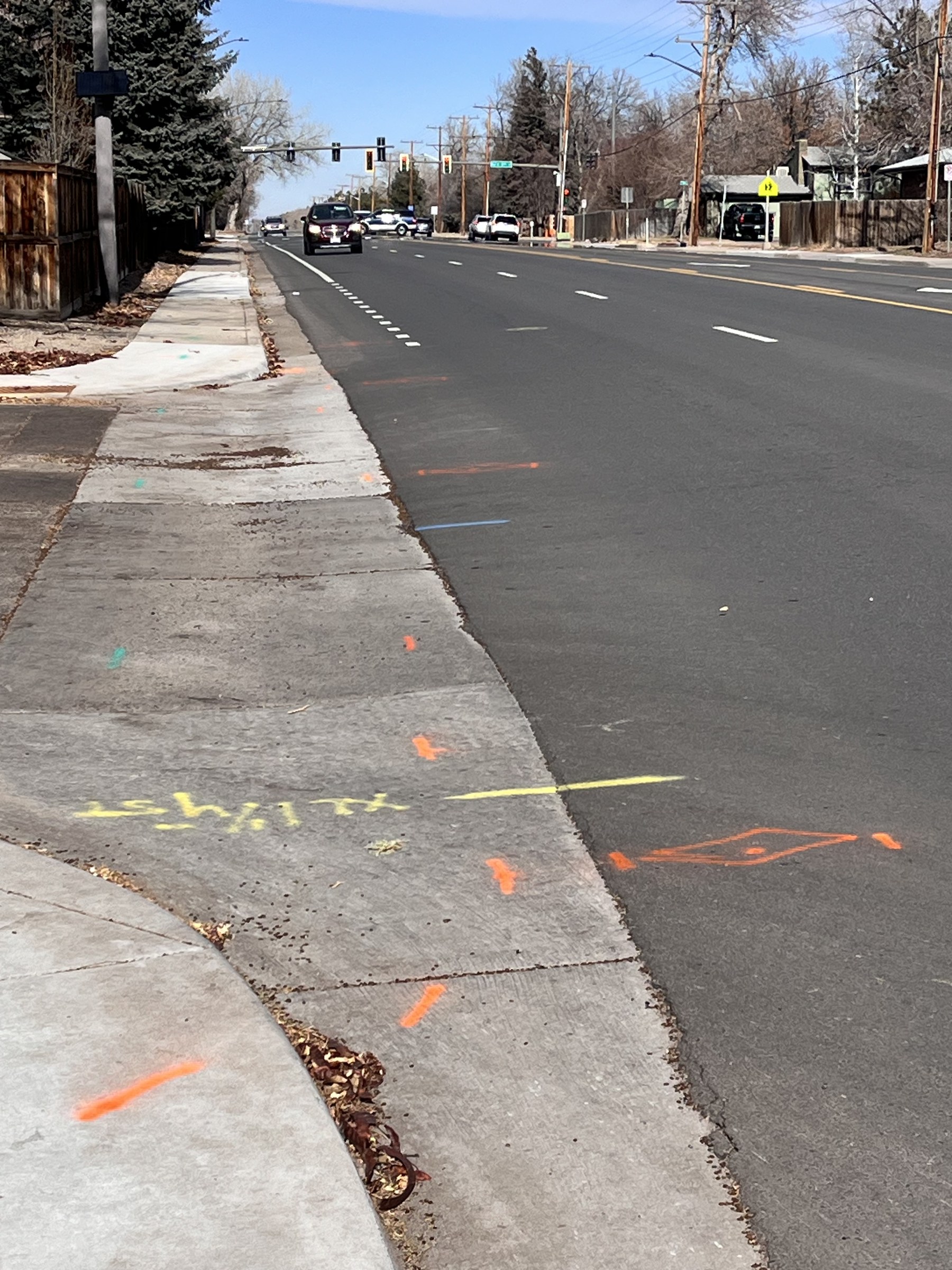 811 utility paint marks on sidewalk and street before digging