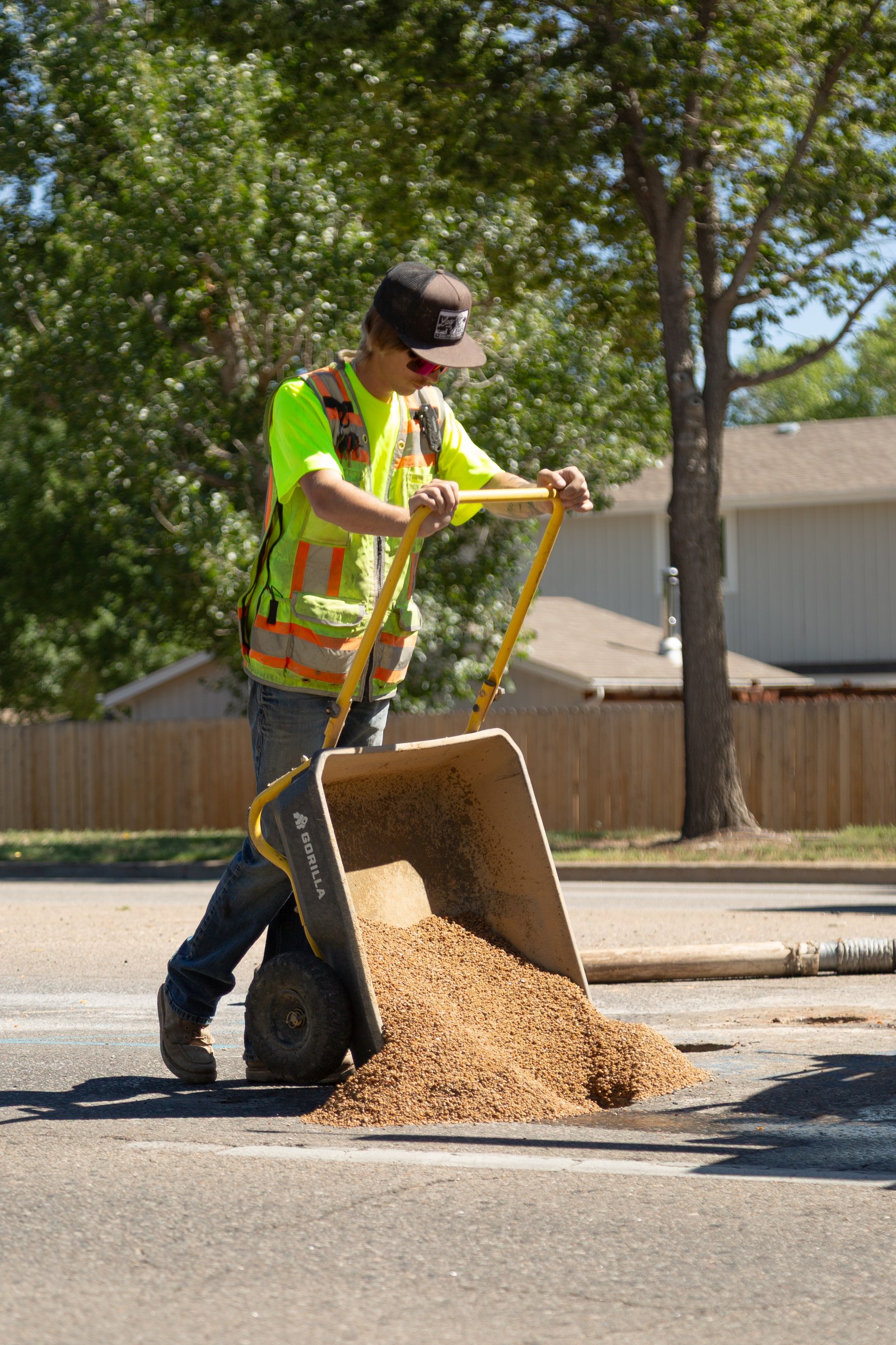 Crew backfilling a completed test hole