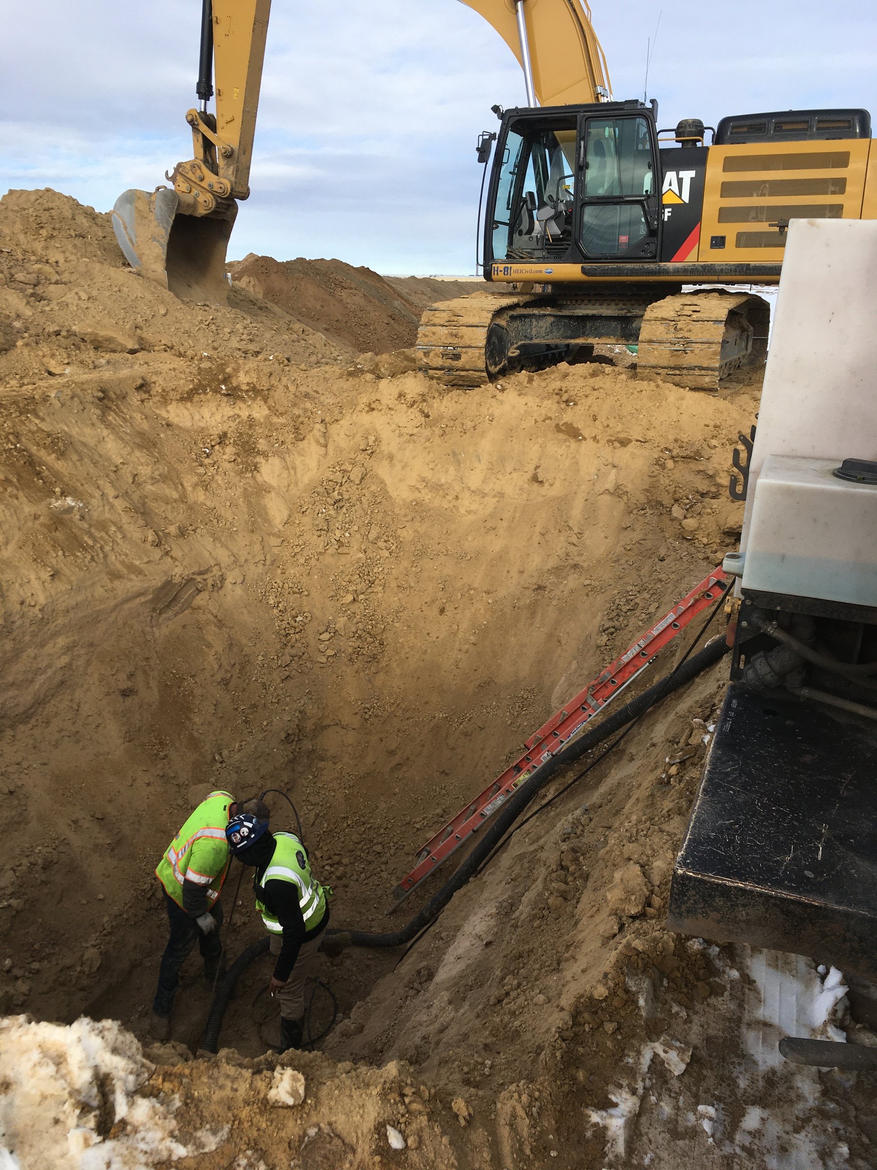 Garney water line near Peña Boulevard
