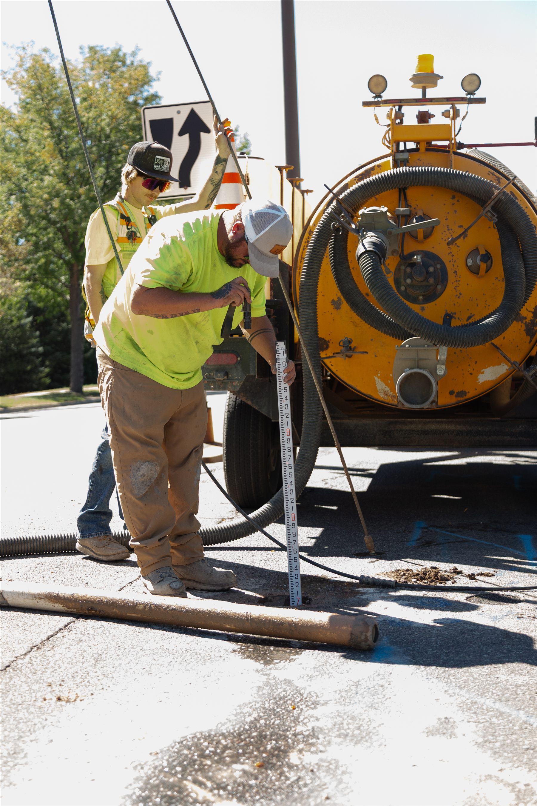 Crew taking field data at a test hole